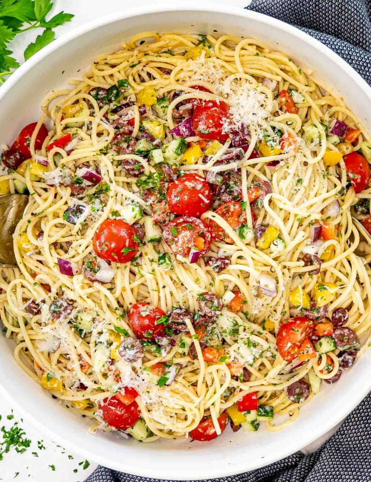 freshly made california spaghetti salad in a big white bowl.