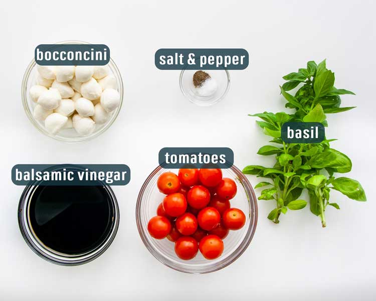 overhead shot of all ingredients needed to make mini caprese salad bites