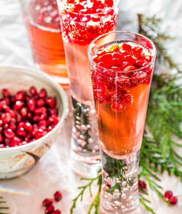 3 glasses of pomegranate elderflower cocktails